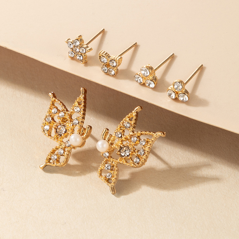 Simple Style Star Butterfly Alloy Inlay Artificial Pearls Rhinestones Unisex Ear Studs 1 Pair