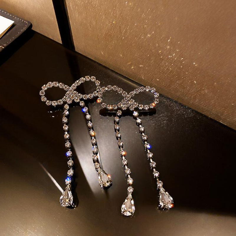 Simple Style Bow Knot Copper Hollow Out Inlay Rhinestones Drop Earrings 1 Pair