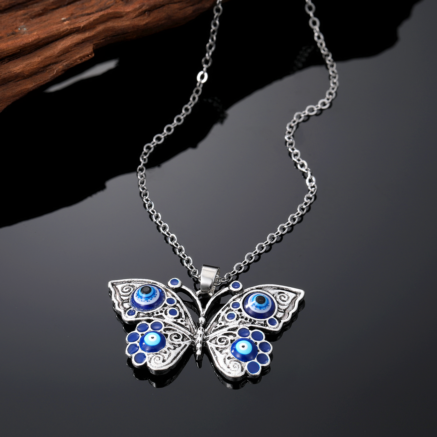 Retro Devilu0027S Eye Butterfly Alloy Womenu0027S Earrings Keychain Necklace