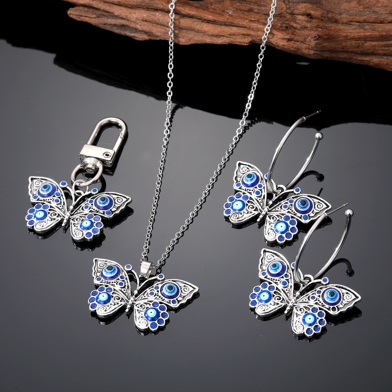 Retro Devilu0027S Eye Butterfly Alloy Womenu0027S Earrings Keychain Necklace