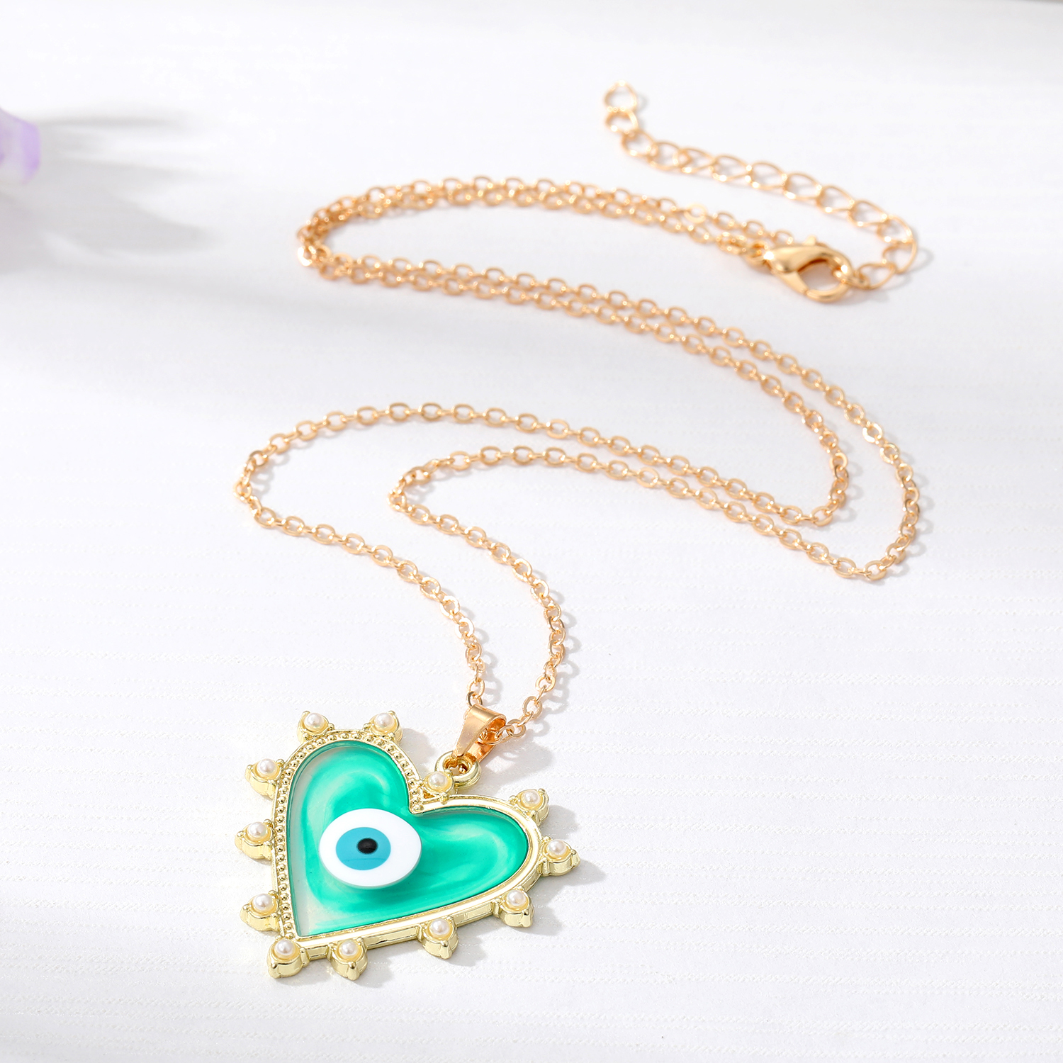 Fashion Simple Style Devilu0027S Eye Heart Shape Alloy Womenu0027S Pendant Necklace
