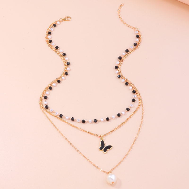 Fashion Ornament Beautiful Beaded Pearl Alloy Clavicle Chain Bow Pendant