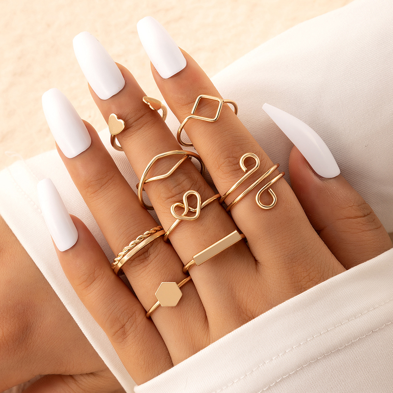 Fashion Simple Hollowed Heart Open Geometric Alloy Ring Eight-Piece Set