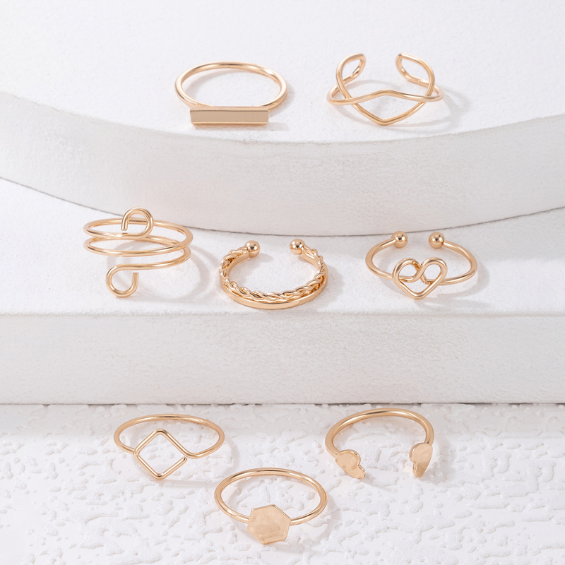 Fashion Simple Hollowed Heart Open Geometric Alloy Ring Eight-Piece Set