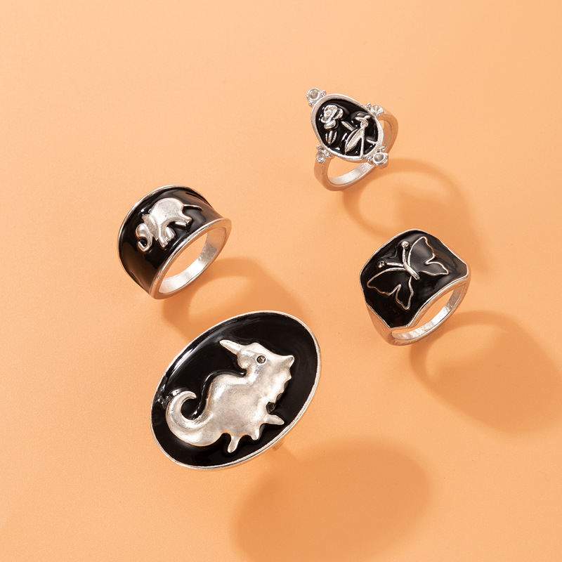 Fashion Ornament Black Dripping Oil Seahorse Elephant Four-Piece Ring